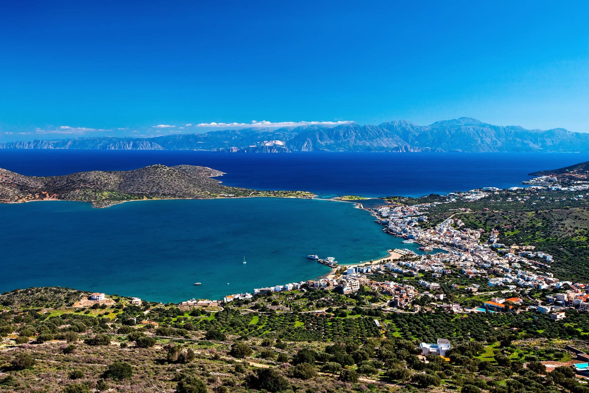 Kouvalite Car Rental | Rent a Car Herkalion, Crete view from above of elounda blue sky