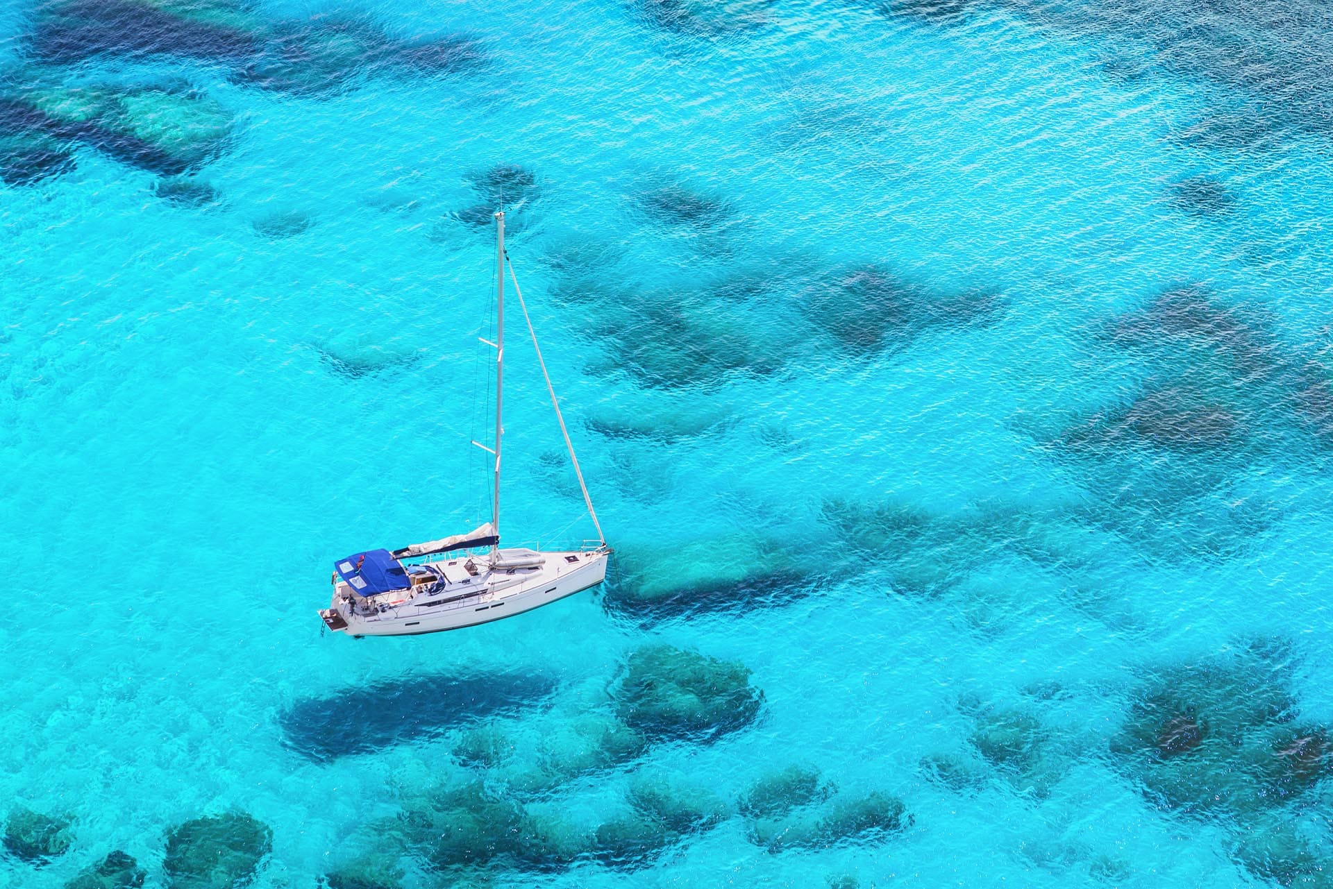 Kouvalite Car Rental | Rent a Car Herkalion, Crete picture of boat sailing in blue waters