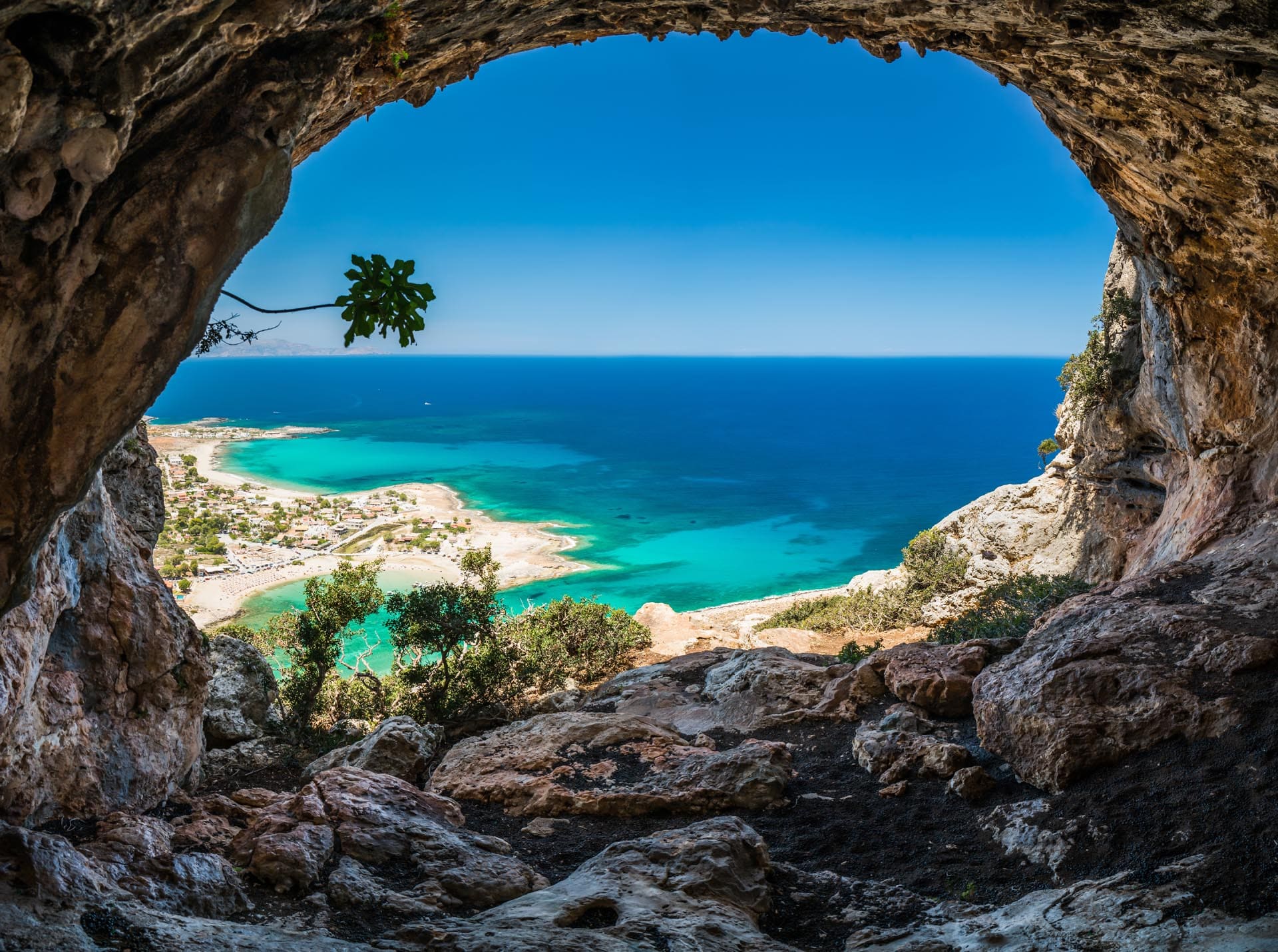Kouvalite Car Rental | Rent a Car Herkalion, Crete picture of the inside of a cave in Spinalonga with sea view