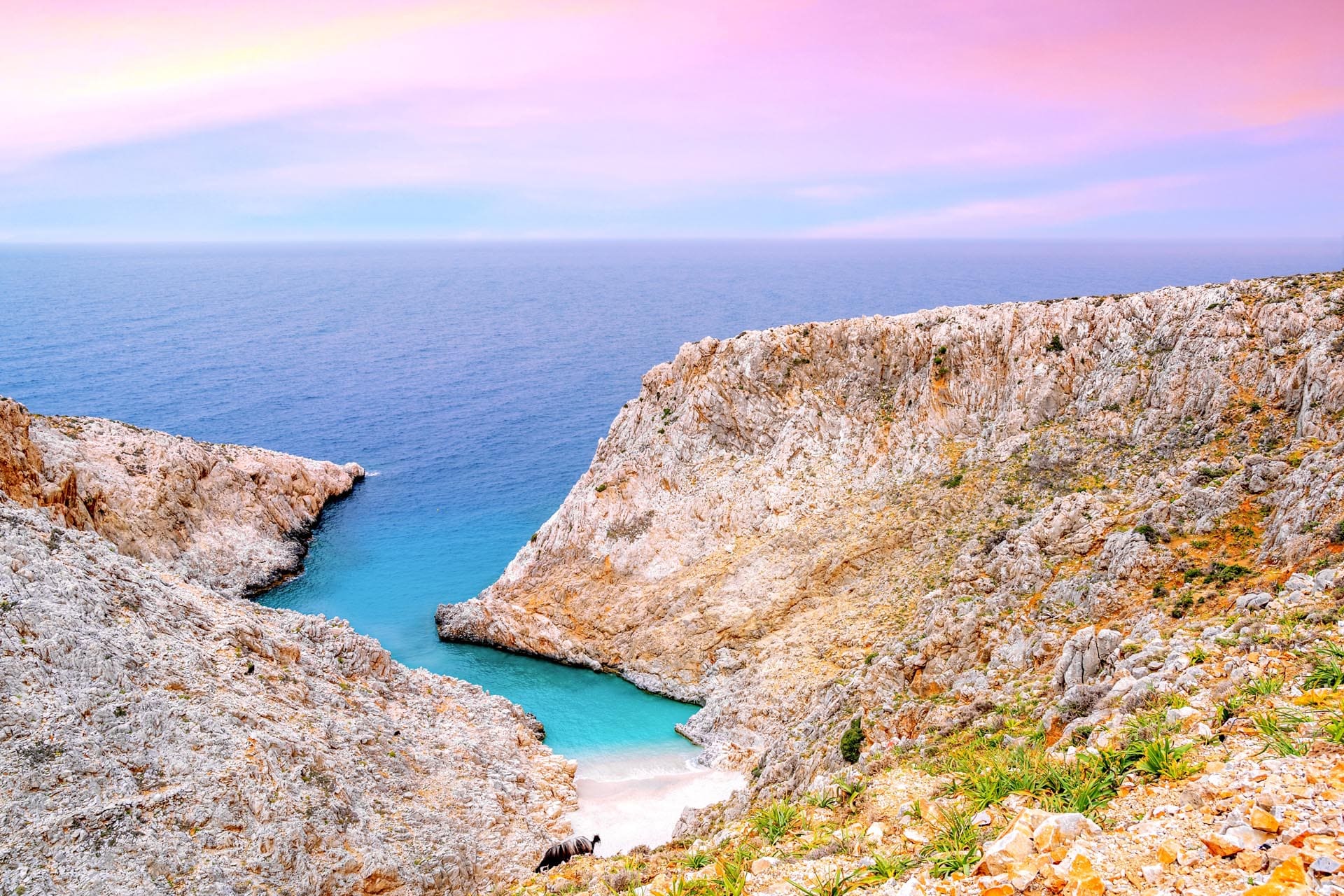Kouvalite Car Rental | Rent a Car Herkalion, Crete pink sunset in Seitan Limani Crete